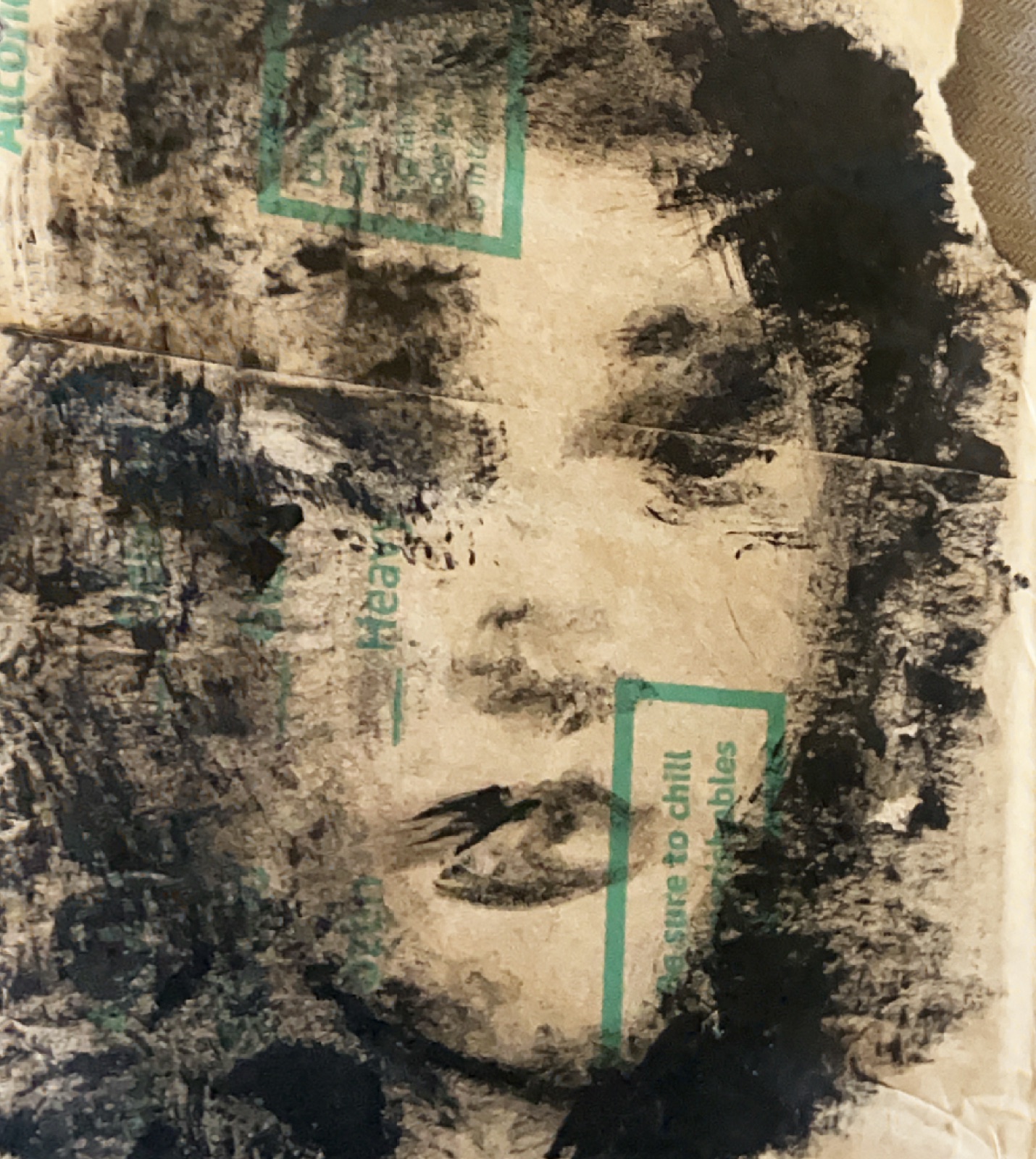 Face monoprint on printed bag