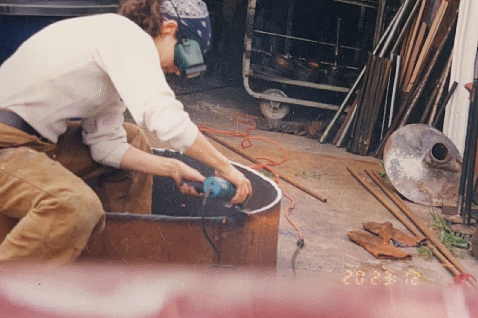Lane VanDeventer welding in the studio
